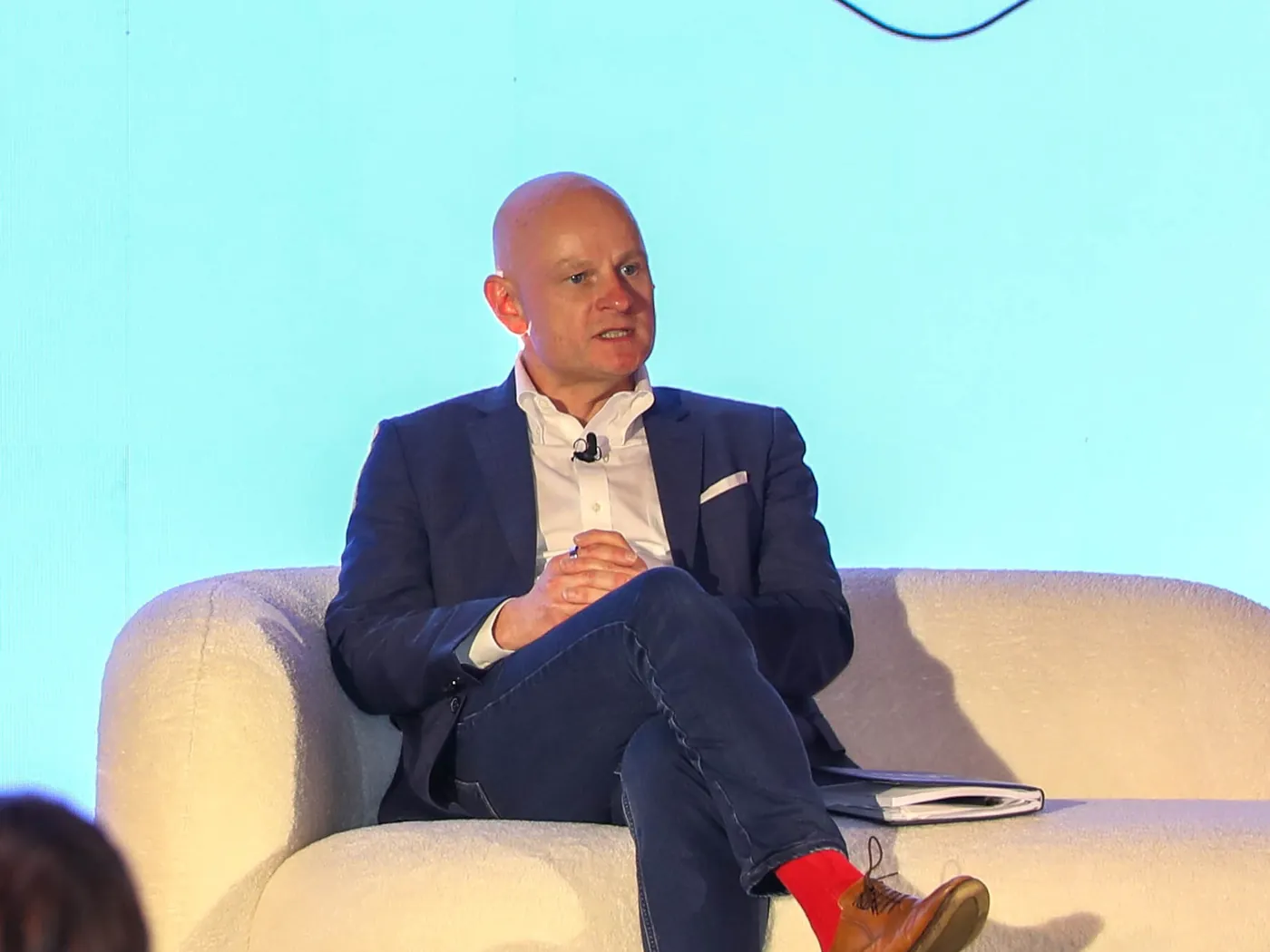 Alex Goryachev speaking about agentic AI at a leadership event